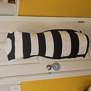 Iconic black and white stripped Calvin Klein midi size 6
